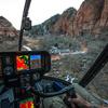 The Robinson R44II maneuvering through a canyon with help from the Garmin HTAWS on the GTN-750 and HSVT on the G500H. - 2013